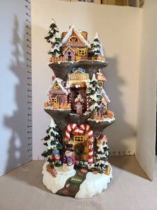 lot 1329 image: Christmas Corner Tiered  Santas Workshop The Inn battery operated  untested music and lights 22 inches tall