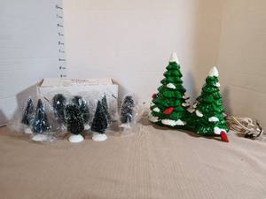 lot 1334 image: Village Frosted Topiary Trees Set of 6 and lighted trees bird fell off tree and trees are flaking