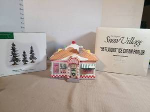 lot 1347 image: The Original Snow Village 56 Flavors Ice Cream Parlor Handpainted Ceramic with Winter Pine trees