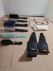 lot 1384 image: Michael Kors eyeglasses with case, copperfit arch supports, hairbrushes.