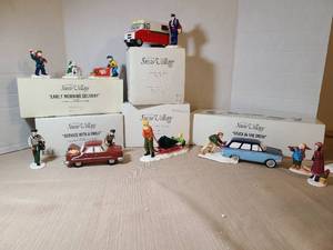 lot 2063 image: The Original Snow Village Handpainted Ceramic Accessories Service with a Simile  and Stuck in the Snow