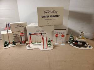 lot 2105 image: The Original Snow Village Ceramic Accessory Winter Playground Phone Booth Fountain