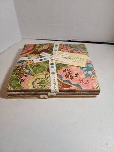 lot 2317 image: Moda Layer Cake and Clever Quilter Daphne Pattern Bundle