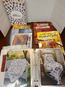 lot 2509 image: Quilting books and three ring binder with patterns.