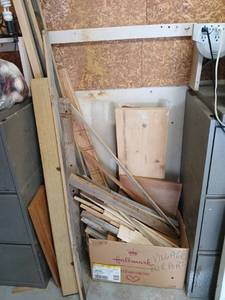 lot 3411 image: Lot of Wood Pieces Boards Scraps Mixed Sizes located in garage largest piece 9x12x2 feet