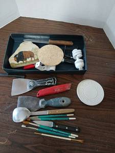 lot 3420 image: Mixed Lot Duncan Brushes, Scrapers, Utility Knife, CFL Bulb, Coaster, Knife, Spoon
