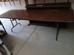 lot 3427 image: Dark Brown folding table 9 foot heavy in garage