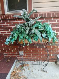 lot 4000 image: Metal Plant Stand with  fake Ferns and Decorative Foliage 62x32x12