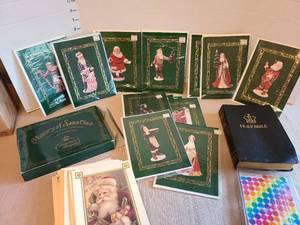lot 7007 image: History of Santa Claus greeting card collection, other Christmas cards, Bible, happy face stickers.