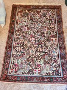 lot 7076 image: Hand-Knotted Wool Rug with Figural and Floral Design, 58x39