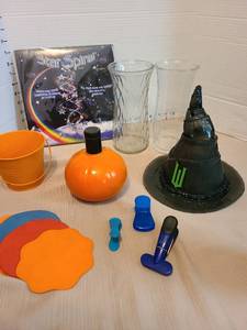 lot 7103 image: Halloween decor, glass vases, chip clips.