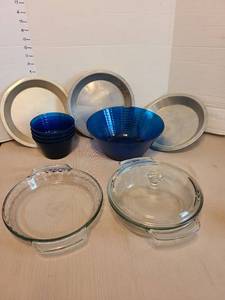 lot 7127 image: Blue plastic salad bowl set, glass quiche pan, covered round casserole, 3 tin pie pans