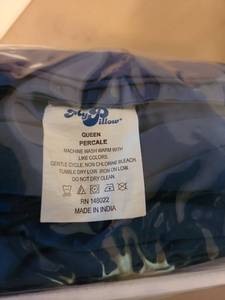lot 7186 image: My Pillow navy blue queen size sheet set and a grey flannel pillow case