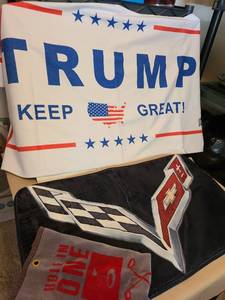 lot 7189 image: Corvette rug, Trump bath towel, golf towel.