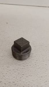 lot 10979 image: Jones Stephens 1-14in Malleable Iron Pipe Plug
