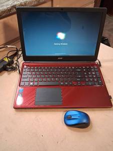 lot 19 image: Acer Red Laptop Windows 7 Home Premium with Blue Mouse