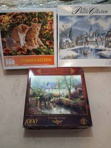 lot 45 image: Thomas Kinkade Sunday Outing 1000 Piece Jigsaw Puzzle 27 x 20