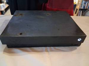 lot 77 image: Microsoft Xbox One X Gaming Console