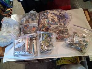 lot 89 image: Lot of Jigsaw Puzzles Mini 150 Piece and Multi-Piece Assorted