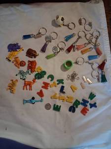 lot 107 image: Toy Lot Keychains Animal Figurines Math Symbols Tassel Charms