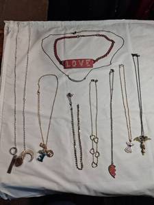 lot 146 image: Lot of 9  Fashion Necklaces with Charms and Pendants