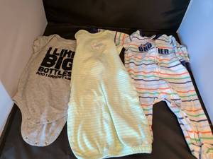 lot 149 image: 0 to 3 months to 12 months. Little boys sizes on tags and pictures