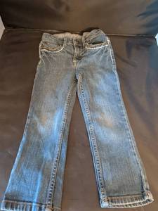 lot 152 image: Childrens Jeans 4T Orange and White Stitched Pockets