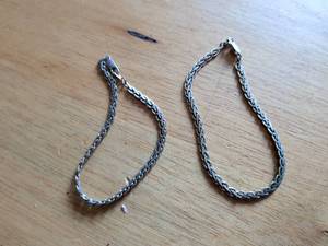 lot 211 image: Two Braided Chain Bracelets with Clasp