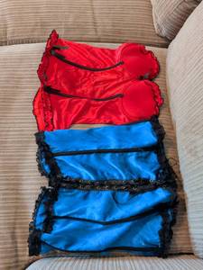 lot 318 image: Two corsets red and blue.