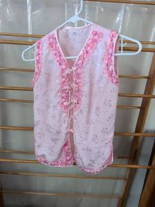 lot 134 image: Girls Pink Floral Vest with Ruffle Trim and Button Front Size 11