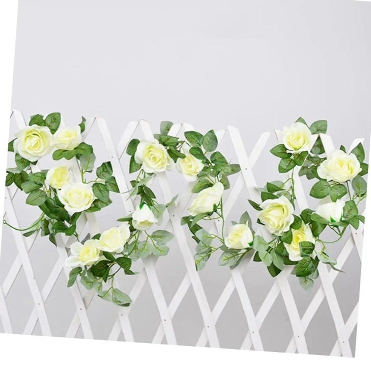 lot 47172 image: Artificial Rose Flower Garland for Wedding and Home Decoration Ivory Rattan Vines for Valentine s Day Balcony Party Table Decor, 2.2m, 6 Pack. - Retail $30