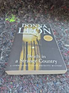 lot 12 image: Death in a Strange Country by Donna Leon Commissario Guido Brunetti Mystery