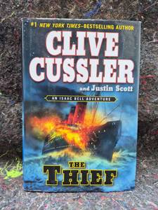 lot 33 image: The Thief by Clive Cussler and Justin Scott, An Isaac Bell Adventure