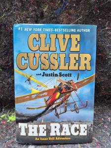 lot 35 image: The Race by Clive Cussler and Justin Scott, Isaac Bell Adventure