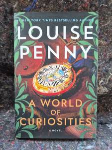 lot 94 image: Louise Penny A World of Curiosities Novel Hardcover Book