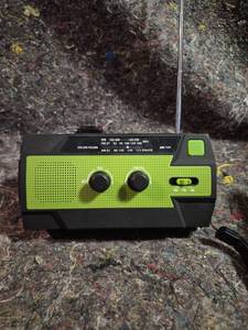 lot 6 image: Portable Solar Radio with LED Flashlight WB FM AM Tuning