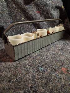 lot 25 image: Metal Caddy Tote with 6 Cream Candles and Decorative Elements