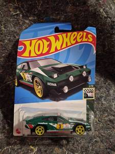 lot 56 image: Hot Wheels Dimachinni Veloce Retro Racers 210 HKH03-M7C5