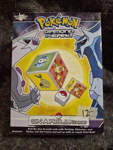 lot 63 image: Pokemon Diamond and Pearl On a Roll Game 1-4 Players Ages 7