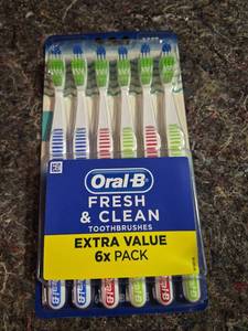 lot 103 image: Oral-B Toothbrush Pack  Essential Clean Manual Toothbrushes  Soft Bristles  6 Count