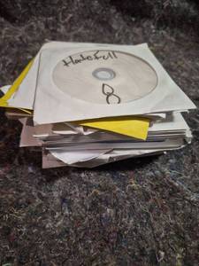 lot 203 image: Lot of 16 DVDs and CDs Handwritten Labels See All Pictures for Titles