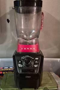 lot 316 image: Oster Versa Blender with Glass Pitcher Red Band - Powers On - Preowned