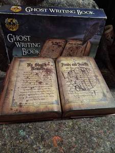lot 413 image: Spirit Halloween Ghost Writing Book Animatronic Prop - Missing Quill