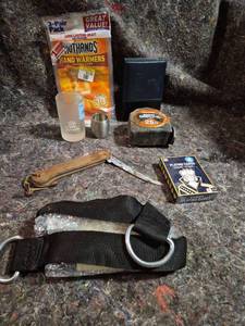 lot 432 image: Mixed Lot HotHands Hand Warmers 3-Pair Swanson 25ft Tape Measure Playing Cards Knife Strap Glasses