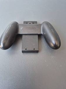 lot 544 image: Nintendo Switch Joy-Con Grip Controller