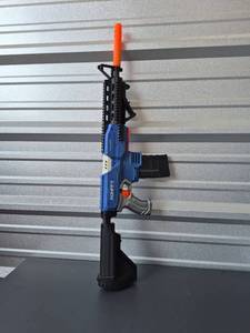 lot 552 image: KONIFFY Foam Dart Blaster Gun with Orange Foam Dart