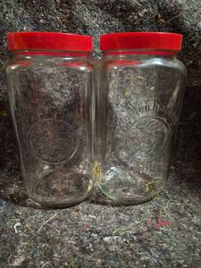 lot 566 image: Golden Harvest 2 Glass Jars Red Lids