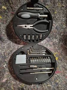 lot 570 image: Mibro Multi-Tool Kit with Hand Tools and Bits in Round Case