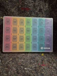 lot 573 image: Auvon Weekly Pill Organizer 28-Compartment Day Night Backup