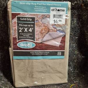 lot 574 image: at home Grip-It Non-Slip Rug Pad 2 X 4 Hard Floors
